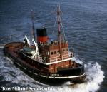 ID 5912 William Watkins' tug DHULIA (1959/300grt/LR Number 5089465) on the Thames. She was broken up in 1983.